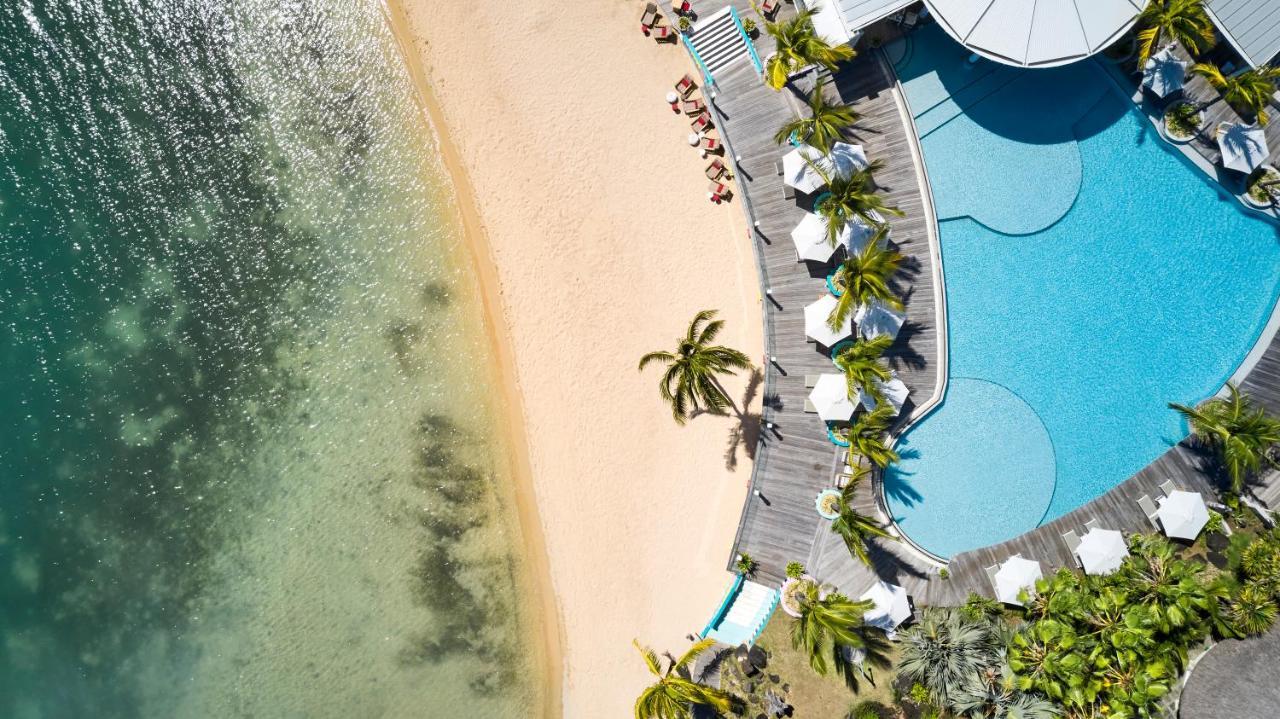 Lux* Grand Gaube Resort & Villas Екстериор снимка Aerial view of the pool and beach at the Sheraton Maldives Resort & Spa