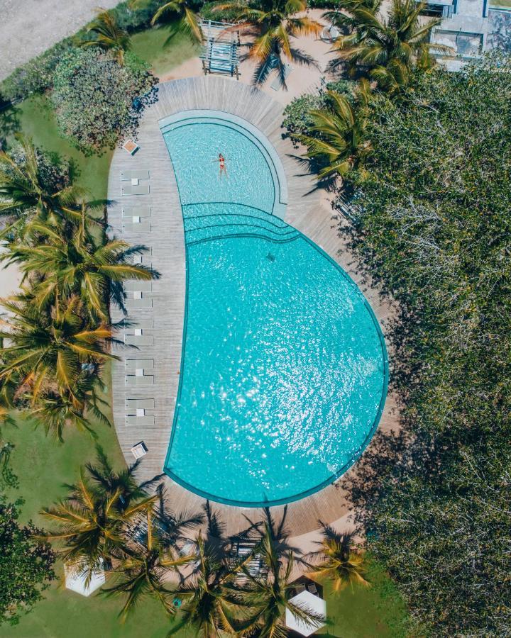 Lux* Grand Gaube Resort & Villas Екстериор снимка Aerial view of the pool at the 2019 World Championships